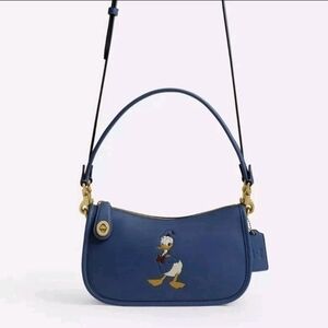 Disney x Coach collabo Swinger Bag / Donald Duck CDN03 B4PF7 Stone Blue